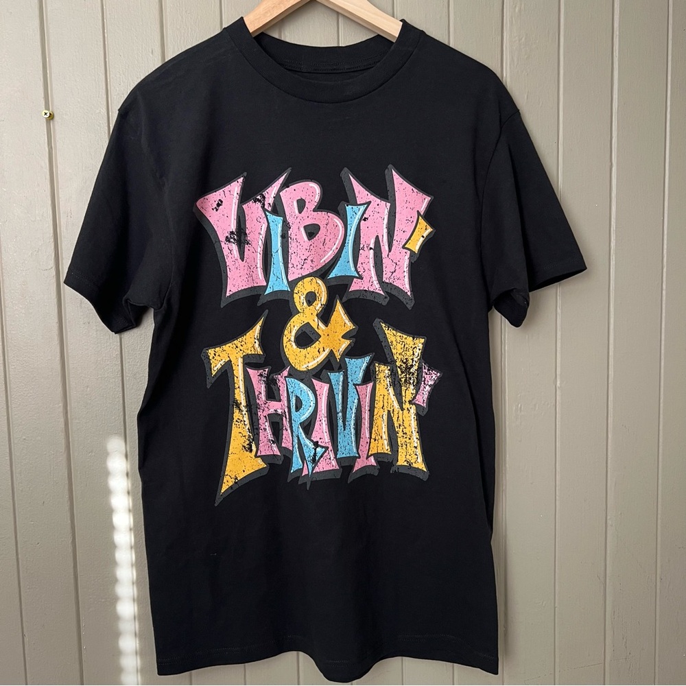 Women’s T-shirt ‘Vibin n Thrivin.’